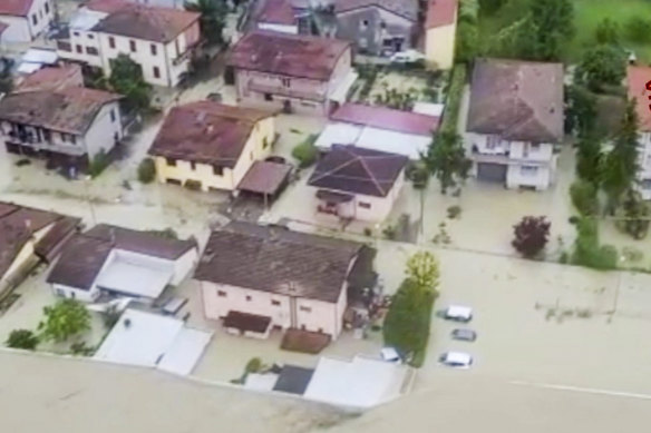 An aerial photo shows flooded houses in Cesena, in the northern Italian region of Emilia-Romagna.
