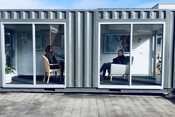 The converted shipping container that allows residents at MACS to have visitors separated by a glass partition.
