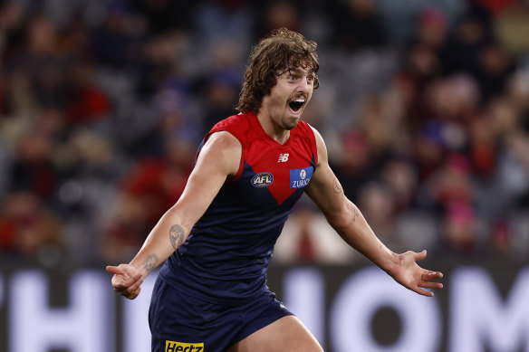 Luke Jackson celebrates a goal for the Demons.