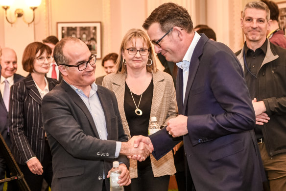 Premier Daniel Andrews shakes hands with outgoing deputy premier James Merlino last month as Merlino’s replacement, Jacinta Allan, looks on.