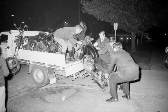 Police with confiscated motorcycles after a running battle with bikies.