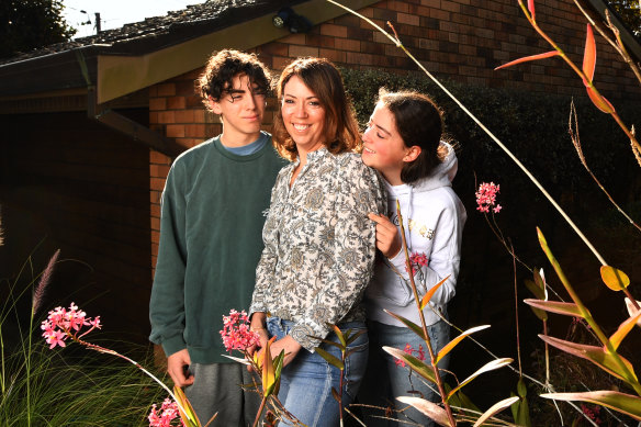 Erin Mitchell at home with children Levi (left) and Nina (right).
