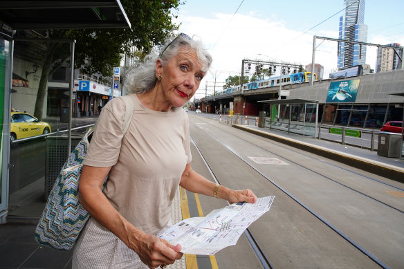 Cheryl O’Brien waits for a tourist tram in the city on Thursday.