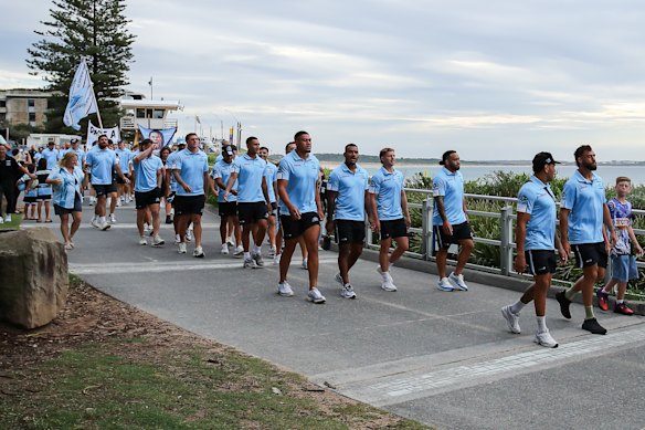 Cronulla’s NRL squad marches into the club’s season launch in the Shire.