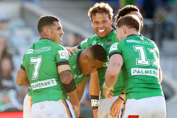 Canberra’s Albert Hopoate celabrates a try against the Panthers.