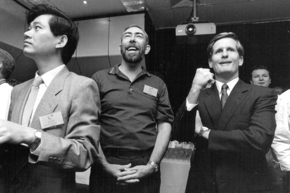 Optus boss Bob Mansfield (r) breathes a mighty sigh of relief after the B3 successfully launches in 1994 after B2s failure.