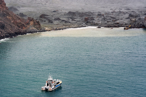 NZ Defence Force recovery teams approach White Island to undertake the grim task of retrieving the victims of the White Island tragedy. 