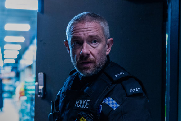 Martin Freeman as troubled Liverpool police office Chris Carson.