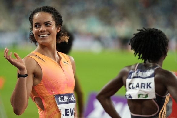 Torrie Lewis reacts after her record-breaking win in the Diamond League.