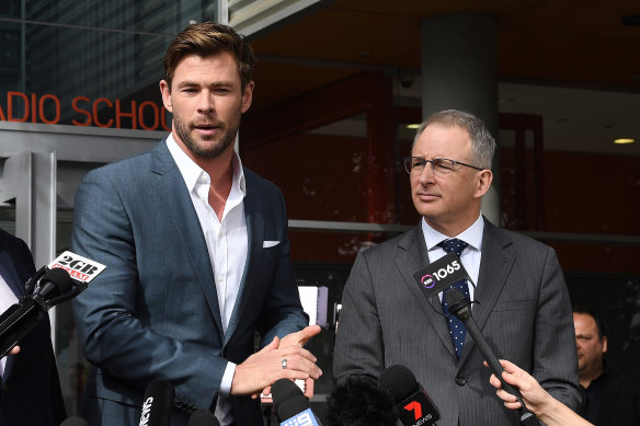 Federal arts minister Paul Fletcher (right) with actor Chris Hemsworth at the July 2019 announcement that a new Marvel movie was set to film in Sydney.