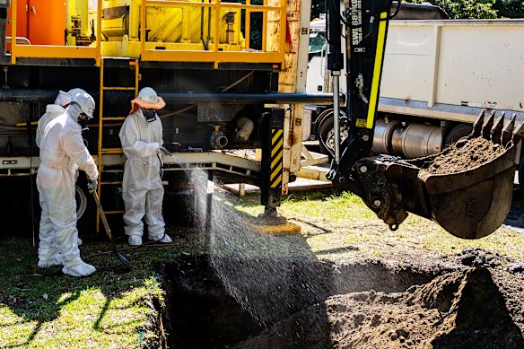 Workers at Wentworth Park on Friday morning.