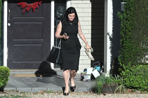 Dominique Grubisa leaving her home in Sydney's northern suburbs.
