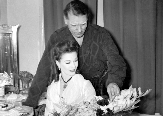 Sir Laurence Olivier and Vivien Leigh in Leigh’s dressing room after the final curtain call on the opening night of The School for Scandal at the Tivoli Theatre, Sydney in June 1948.