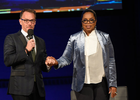 Erik Logan and Oprah Winfrey at New York’s Apollo Theatre in 2018.