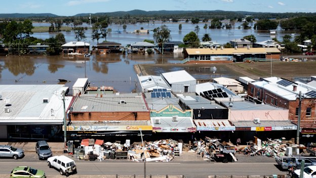 The shops along the main street of Woodburn have all their destroyed goods on the footpath