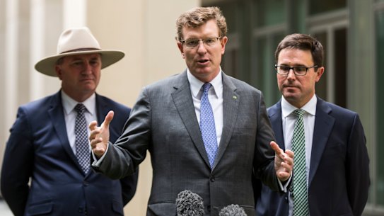 Nationals minister Andrew Gee (centre) has warned his party will need assurances before supporting the proposed university overhaul. 