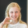 The first coin strike of 2019 is given to winner Celeste Weerts, pictured, at the Royal Australian Mint.