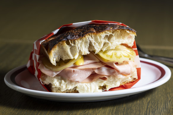 Mortadella, salami and green tomatoes in focaccia at Studio Amaro.