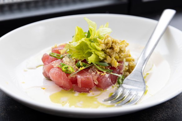 Pesce crudo with toasted almond milk and a green olive emulsion.