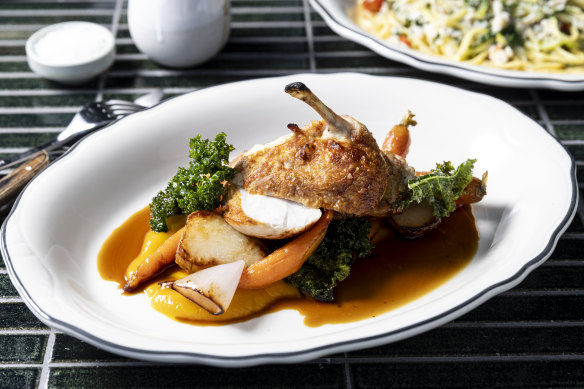 Grilled chicken with pumpkin puree and vegetables.