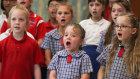 School children have been singing I Am Australian for some year. 