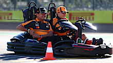 Norris and Piastri driving a two-seater go-kart ahead of the British Grand Prix.