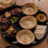 Hoppers and curry sets are a mainstay at Many Little.