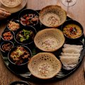 Hoppers and curry sets are a mainstay at Many Little.