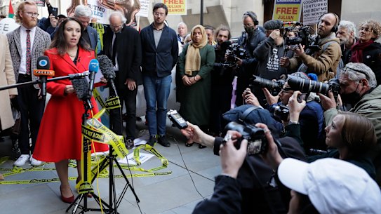 Stella Moris, partner of Julian Assange gives a statement outside the Old Bailey in London on Thursday.
