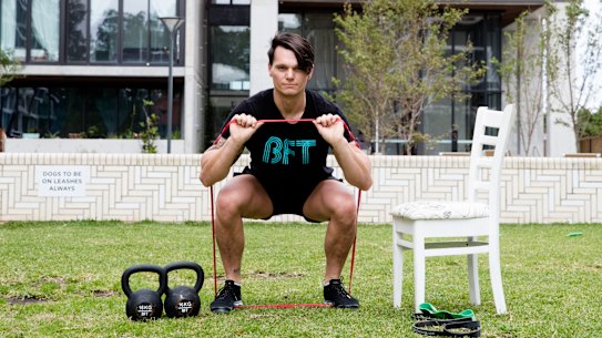 Fitness trainer Jeremy Tunkuna using some of his home equipment.