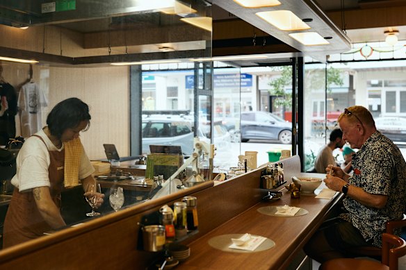 Cafe Ogawa has magnetic phone holders on the ceiling, ready for overhead shots of its broth.