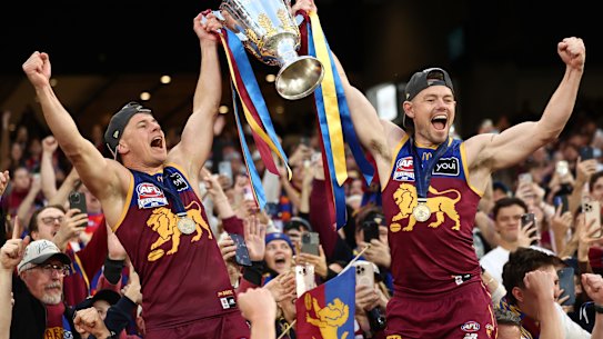 Dayne Zorko and Lachie Neale celebrate another premiership.