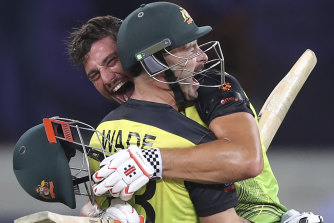 Marcus Stoinis, right, and Matthew Wade celebrate after winning the Twenty20 World Cup semi-final against Pakistan. 