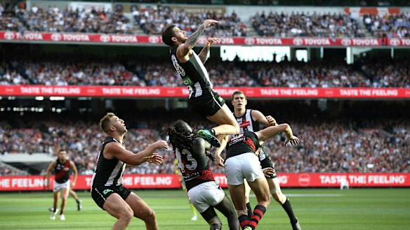 Jeremy Howe flys over Joe Daniher.