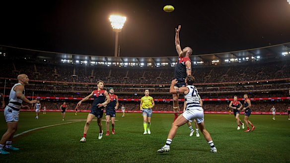 Max Gawn rises above Tom Hawkins at the MCG.