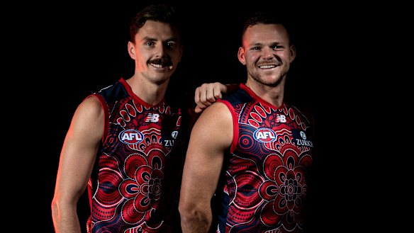 Jake Lever and Steven May in Melbourne’s 2021 Sir Douglas Nicholls AFL Round Indigenous guernsey. It was designed by Arrernte artist Amunda Gorey and it is named ‘Ayeye Anwernekenhe’, which means ‘Our Story’.