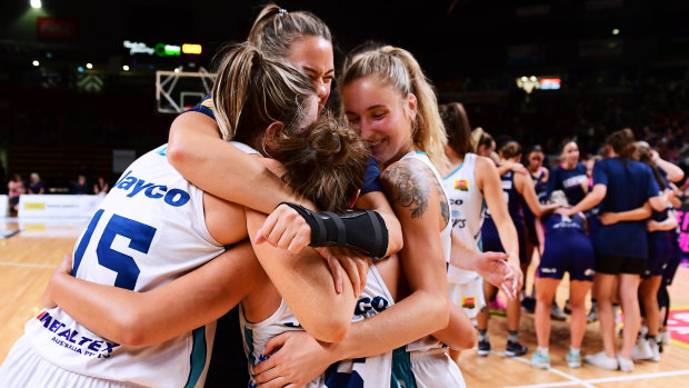 Dream debut: The Flyers celebrate after sealing a spot in the WNBL grand final series.