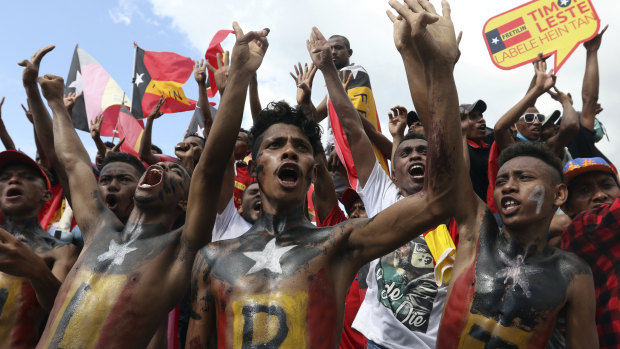 Supporters shout slogans during a Fretilin campaign rally this week.