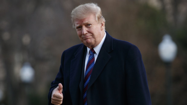Donald Trump gives the thumbs-up as he returns from his annual physical exam at Walter Reed National Military Medical Center last week.