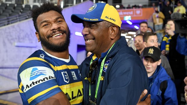 Special occasion: Maika Sivo celebrates the win over the Knights with his proud dad Joeli.