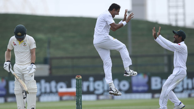 Pakistan's Mohammad Abbas celebrates the dismissal of Australia's Travis Head during a Test series last year.