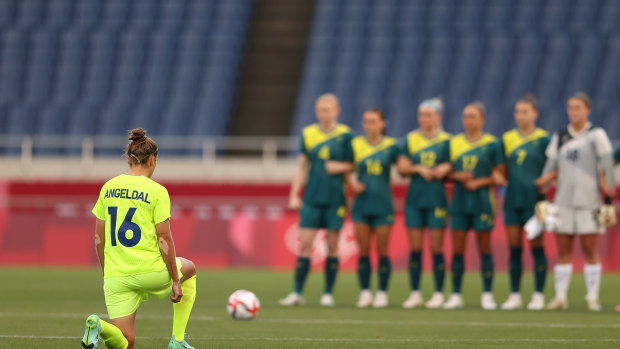 Filippa Angeldal of Sweden takes a knee in support of the racial equality before kick-off.