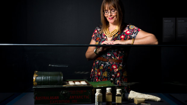 National museum curator Cheryl Crilly with a medicine chest that had been prepared to travel with Douglas Mawson for his 1911 trip to the Antarctic. 