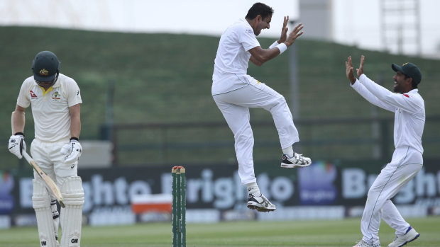 Pakistan's Mohammad Abbas celebrates the dismissal of Australia's Travis Head.