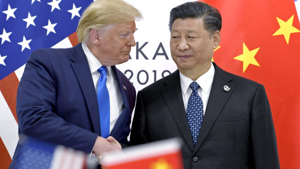 China's President Xi Jinping with US President Donald Trump in 2019. Xi is yet to congratulate President-elect Joe Biden.