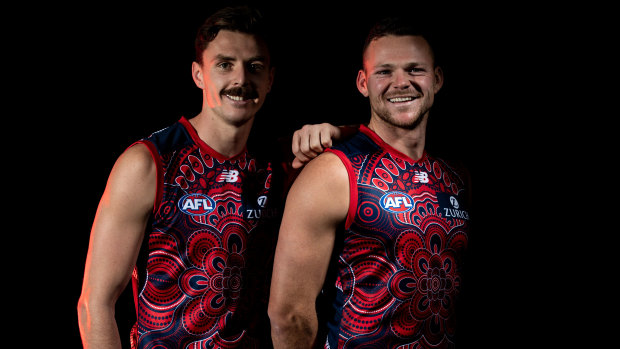 Jake Lever and Steven May in Melbourne’s 2021 Sir Douglas Nicholls AFL Round Indigenous guernsey. It was designed by Arrernte artist Amunda Gorey and it is named ‘Ayeye Anwernekenhe’, which means ‘Our Story’.