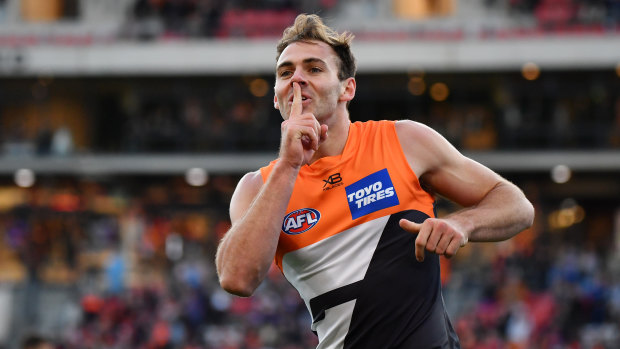 Silenced: Jeremy Finlayson motions to the crowd after kicking a goal in the elimination final against the Bulldogs.