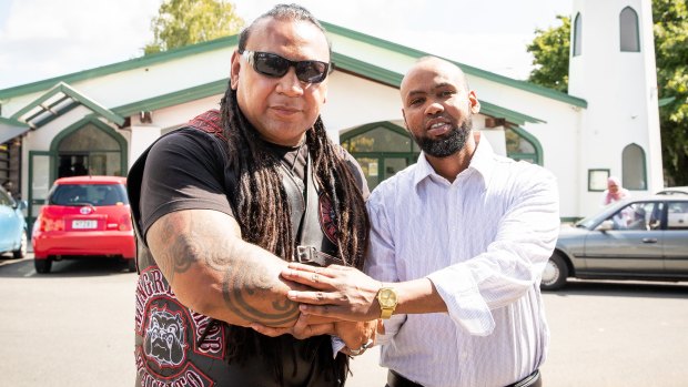 Mongrel Mob Waikato president Sonny Fatu with Hanad Ibrahim from Jamia Mosque in Hamilton.