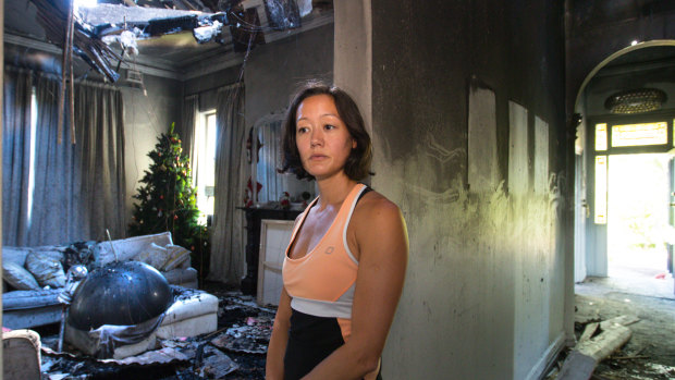 Sam Taylor inside her home which was destroyed by fire. 