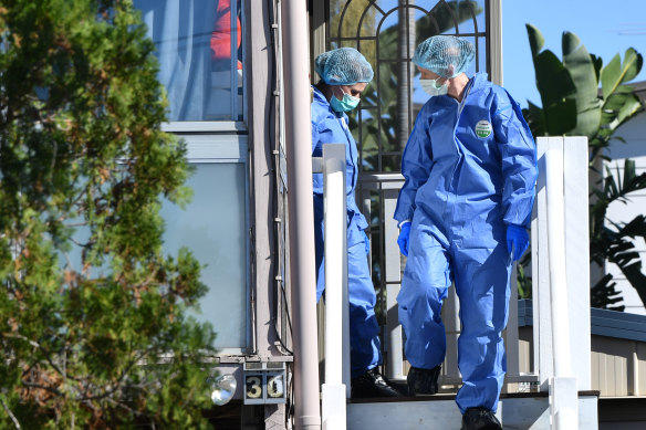 Forensic officers combed the Bent Street house.